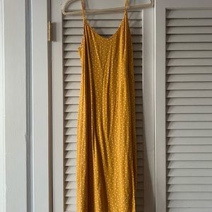 yellow midi dress with polka dots and a slit!